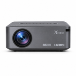 A compact Xnano 8K video projector with HDMI output, shown from a front-facing perspective on a clean white background.